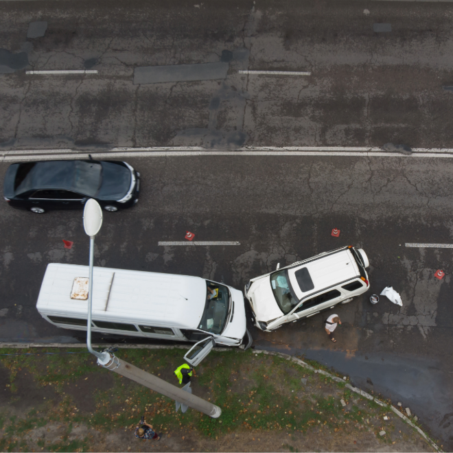 Aerial view of a transit bus and police crash scene
