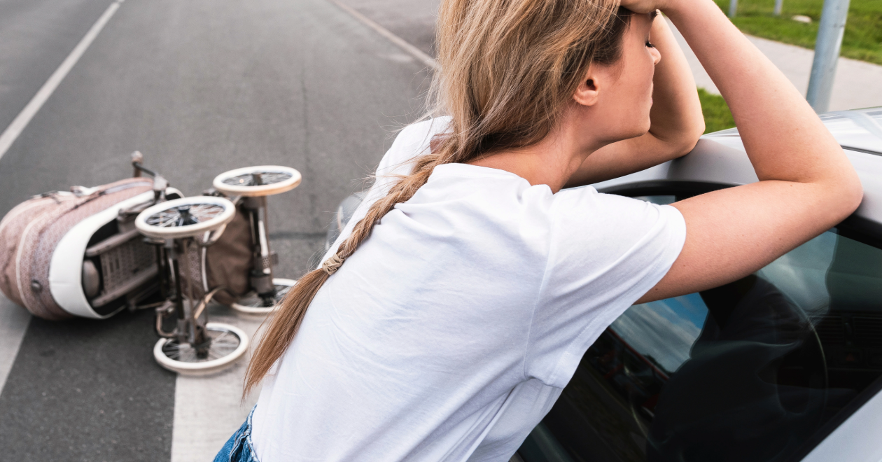 Woman reacting after a scooter crosswalk crash