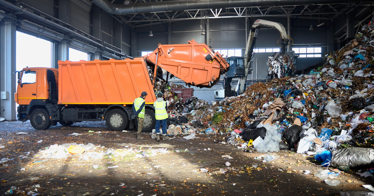 Garbage truck inside a waste transfer station